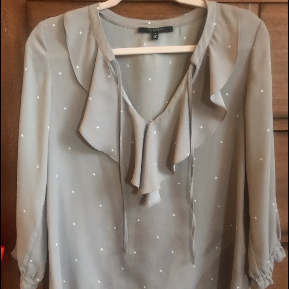 Beautiful airy lavender blouse. Pretty neck detail